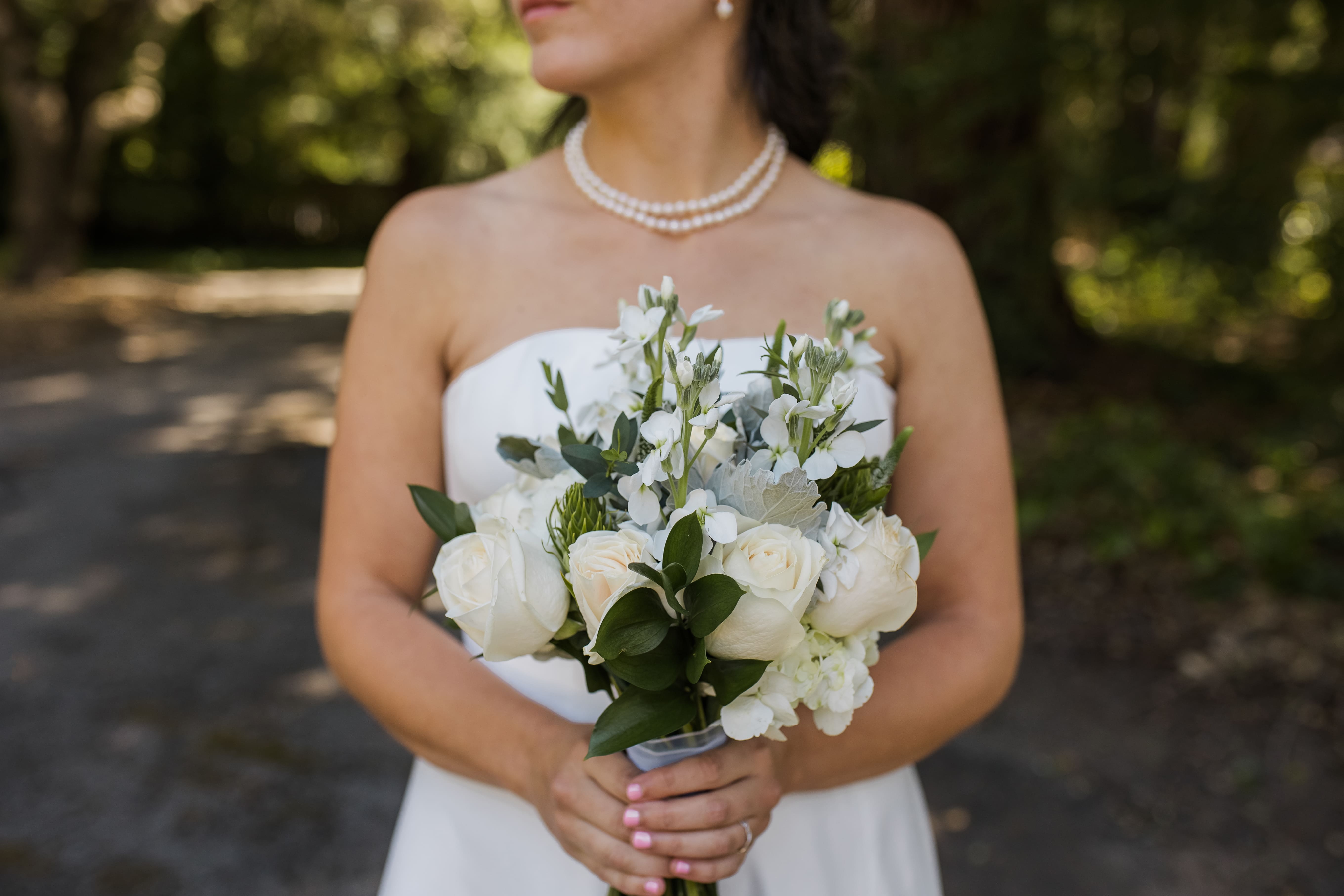 A bride on her wedding day with flowers